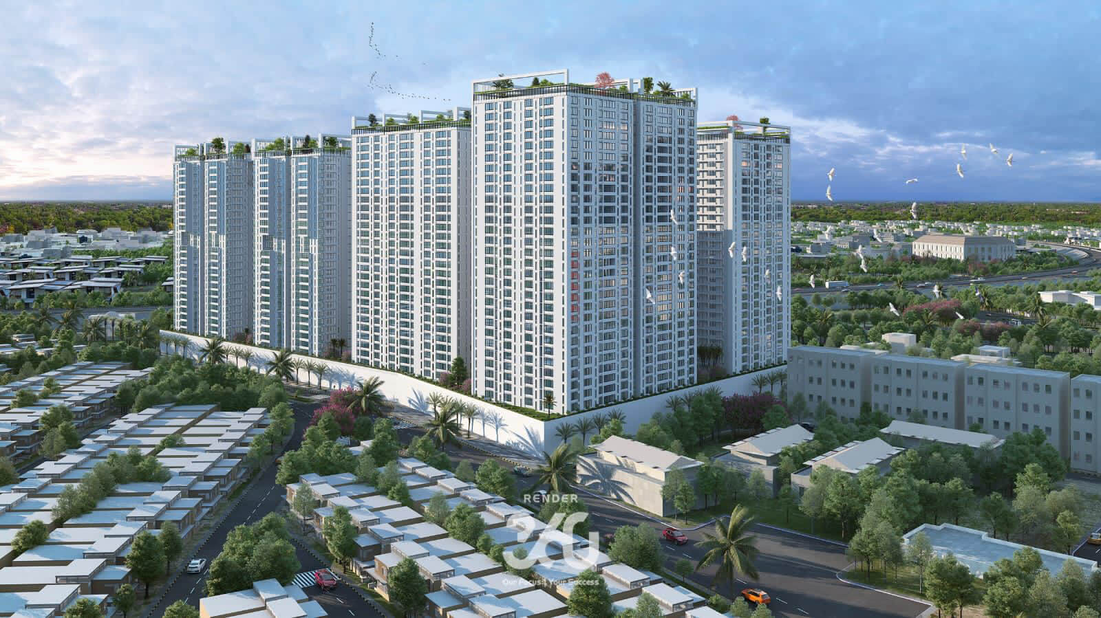 Aerial view of Goldcrest Bay Sands high-rise towers in DHA Karachi waterfront, with green rooftops and lush surroundings